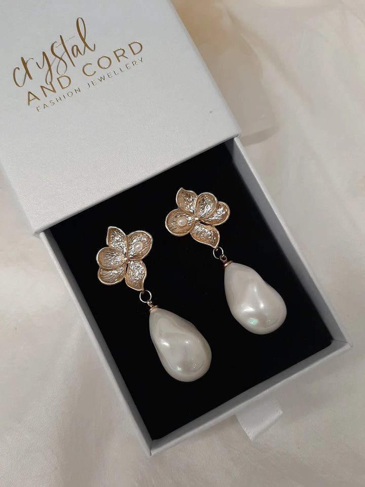 Crystal and Cord Monica - Faux Pearl drop and gold tone petal flower earrings - Shop 9