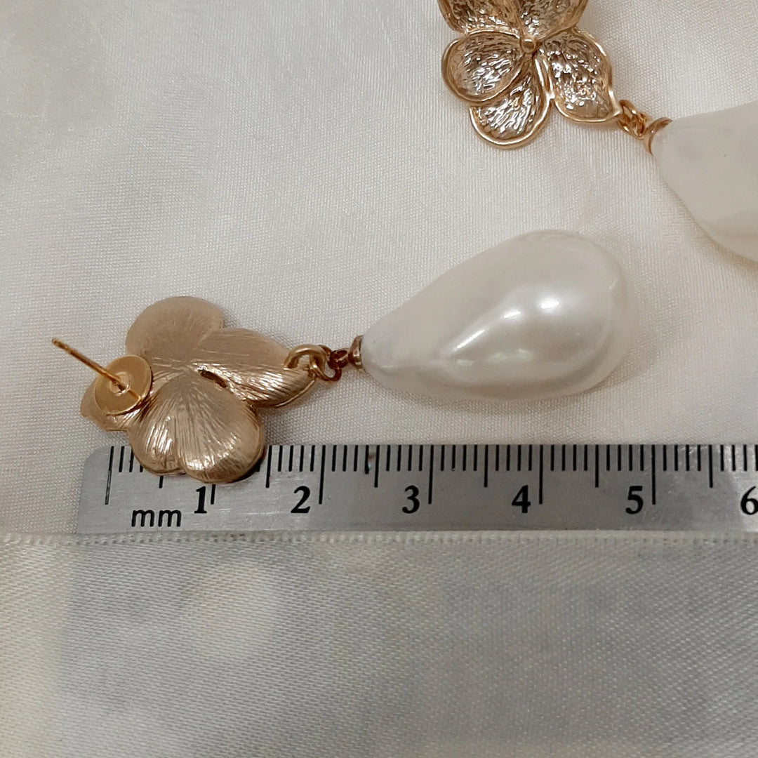 Crystal and Cord Monica - Faux Pearl drop and gold tone petal flower earrings - Shop 9